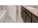 Charming bathroom with updated vanity, granite counters and tiled floors at 2001 Bal Harbor Blvd # 2306, Punta Gorda, FL 33950