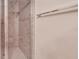 The tiled walk-in shower features a glass door and shower head at 2001 Bal Harbor Blvd # 2306, Punta Gorda, FL 33950