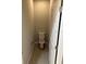Small toilet room with updated fixtures and modern flooring at 207 Baytree Dr, Rotonda West, FL 33947