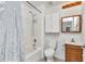 Bathroom with a shower/tub combo, single sink vanity, and neutral wall color at 22299 Laramore Ave, Port Charlotte, FL 33952