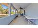Enclosed patio offers plenty of space and outdoor living at 22299 Laramore Ave, Port Charlotte, FL 33952