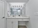 Stylish bathroom with a modern vanity, ample storage, and elegant decor enhances the space at 229 Waterside St, Port Charlotte, FL 33954