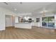 Modern kitchen with white cabinets, stainless steel appliances, and a peninsula counter at 229 Waterside St, Port Charlotte, FL 33954