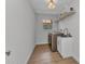 Well-lit laundry room equipped with modern washer, dryer, and utility sink for added convenience at 229 Waterside St, Port Charlotte, FL 33954
