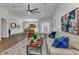 Spacious living room with wood floors, stylish décor, and open layout at 229 Waterside St, Port Charlotte, FL 33954