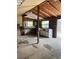 Interior of unfinished storage shed with workbench and plenty of room for activities at 23165 Glen Ave, Punta Gorda, FL 33980