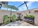 Lush patio with potted plants and a cozy outdoor setting, creating a serene atmosphere at 232 W Henry St, Punta Gorda, FL 33950