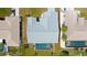 This property boasts a private screened-in pool and boat dock perfect for relaxing or entertaining guests at 2399 Bendway Dr, Port Charlotte, FL 33948