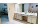 Bathroom view into the room with dual vanity at 2399 Bendway Dr, Port Charlotte, FL 33948