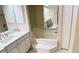 Bathroom featuring a large jetted tub with steps at 2399 Bendway Dr, Port Charlotte, FL 33948