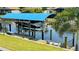 The property includes a private boat lift, providing easy access to waterways and boating adventures at 2399 Bendway Dr, Port Charlotte, FL 33948
