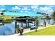 View of boat on lift with covered top at 2399 Bendway Dr, Port Charlotte, FL 33948