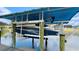 View of boat on lift with canopy above it at 2399 Bendway Dr, Port Charlotte, FL 33948