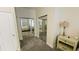 Bedroom showing mirrored closet doors and a glimpse of the bedroom inside at 2399 Bendway Dr, Port Charlotte, FL 33948