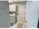 Functional laundry room equipped with a washing machine and dryer, plus storage at 2399 Bendway Dr, Port Charlotte, FL 33948