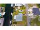 Aerial shot of a waterfront property with an RV and boat highlighted within property lines at 24239 Yacht Club Blvd, Punta Gorda, FL 33955
