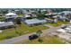 Beautiful waterfront lot with mature landscaping, plenty of room for an RV, boat, and more at 24239 Yacht Club Blvd, Punta Gorda, FL 33955