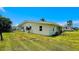 The home features a spacious backyard, perfect for outdoor activities and entertaining at 24239 Yacht Club Blvd, Punta Gorda, FL 33955