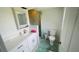 Clean bathroom with a vanity, updated shower, and neutral accents at 24239 Yacht Club Blvd, Punta Gorda, FL 33955