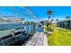 Waterfront property with a boat dock and lift, providing convenient access to the canal at 24239 Yacht Club Blvd, Punta Gorda, FL 33955