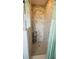 Modern bathroom shower with stylish tile work and adjustable shower head at 24239 Yacht Club Blvd, Punta Gorda, FL 33955