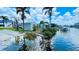 Scenic waterfront view showcasing the property's access to the serene waterway at 24239 Yacht Club Blvd, Punta Gorda, FL 33955