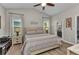 Calm bedroom with vaulted ceiling, neutral decor and serene atmosphere at 24358 Folkstone Ave, Punta Gorda, FL 33980
