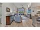 Bright living room with high ceilings, hardwood floors, and stylish furnishings at 24358 Folkstone Ave, Punta Gorda, FL 33980