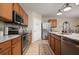 Spacious kitchen with stainless steel appliances and ample countertop space, offering modern convenience at 25008 Lalique Pl, Punta Gorda, FL 33950