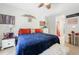 Comfortable bedroom features a cozy bed, white walls, and decorative accents throughout the space at 2515 Sherman Oak Dr, North Port, FL 34289