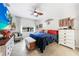 Comfortable bedroom features a cozy bed, white walls, and decorative accents throughout the space at 2515 Sherman Oak Dr, North Port, FL 34289