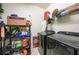 Laundry room featuring modern washer and dryer units, storage shelves, and organization for an efficient laundry space at 2515 Sherman Oak Dr, North Port, FL 34289