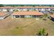 Scenic backyard aerial shot featuring a lake view from the screened in lanai at 25275 Rampart Blvd # 1504, Punta Gorda, FL 33983
