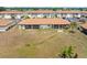Scenic backyard aerial shot featuring a lake view from the screened in lanai at 25275 Rampart Blvd # 1504, Punta Gorda, FL 33983