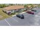Charming condo exterior featuring well-manicured landscaping and convenient parking at 25275 Rampart Blvd # 1504, Punta Gorda, FL 33983