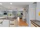 Modern kitchen featuring stainless steel appliances, ample counter space, and seamless open-concept layout at 25275 Rampart Blvd # 1504, Punta Gorda, FL 33983