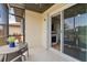 Enclosed lanai area with table, chairs, and view to the interior at 25275 Rampart Blvd # 1504, Punta Gorda, FL 33983