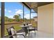 Inviting screened lanai with seating, perfect for enjoying the serene landscape at 25275 Rampart Blvd # 1504, Punta Gorda, FL 33983