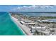 Stunning aerial view of a coastal community with beautiful beaches and waterfront homes at 2590 N Beach Rd # 5, Englewood, FL 34223