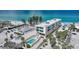 Stunning aerial view of a beachfront condo with a private pool, showcasing its prime location and coastal charm at 2590 N Beach Rd # 5, Englewood, FL 34223