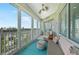 Relaxing balcony with comfortable seating and scenic views, perfect for enjoying the outdoors and surrounding scenery at 2590 N Beach Rd # 5, Englewood, FL 34223