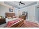 Cozy bedroom featuring a stylish bed, colorful accents, and modern decor, creating a comfortable retreat at 2590 N Beach Rd # 5, Englewood, FL 34223
