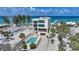 Stunning beachfront home with a private pool, lush landscaping, and panoramic ocean views at 2590 N Beach Rd # 5, Englewood, FL 34223