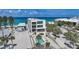 Modern beachfront home with a private pool, lush landscaping, and stunning views of the ocean at 2590 N Beach Rd # 5, Englewood, FL 34223