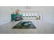 Bright living room with fireplace, natural light, and stylish decor, offering a warm and inviting atmosphere at 2590 N Beach Rd # 5, Englewood, FL 34223
