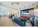 Inviting living room showcases a large built-in entertainment center and open flow to the kitchen at 2590 N Beach Rd # 5, Englewood, FL 34223