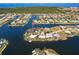 Aerial view showing boating access in a waterfront neighborhood community at 261 Venezia Ct, Punta Gorda, FL 33950