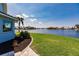 Landscaped yard overlooking the canal at 261 Venezia Ct, Punta Gorda, FL 33950