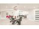 Dining area with modern lighting, marble flooring, and open concept design at 261 Venezia Ct, Punta Gorda, FL 33950
