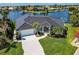 Stunning waterfront home with a well-manicured lawn and a private boat dock at 261 Venezia Ct, Punta Gorda, FL 33950